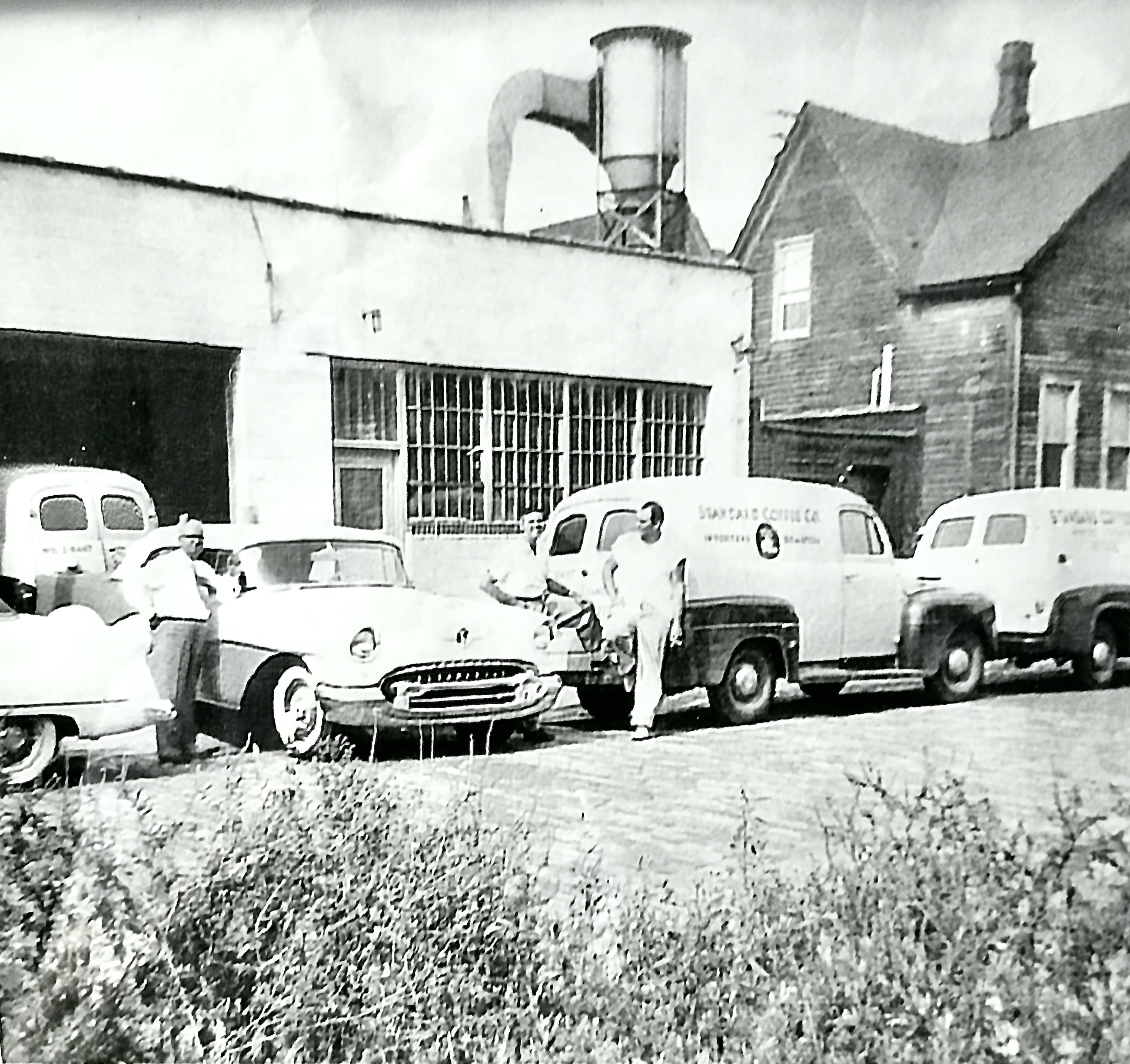 Standard Coffee Company delivery trucks outside the Detroit roastery